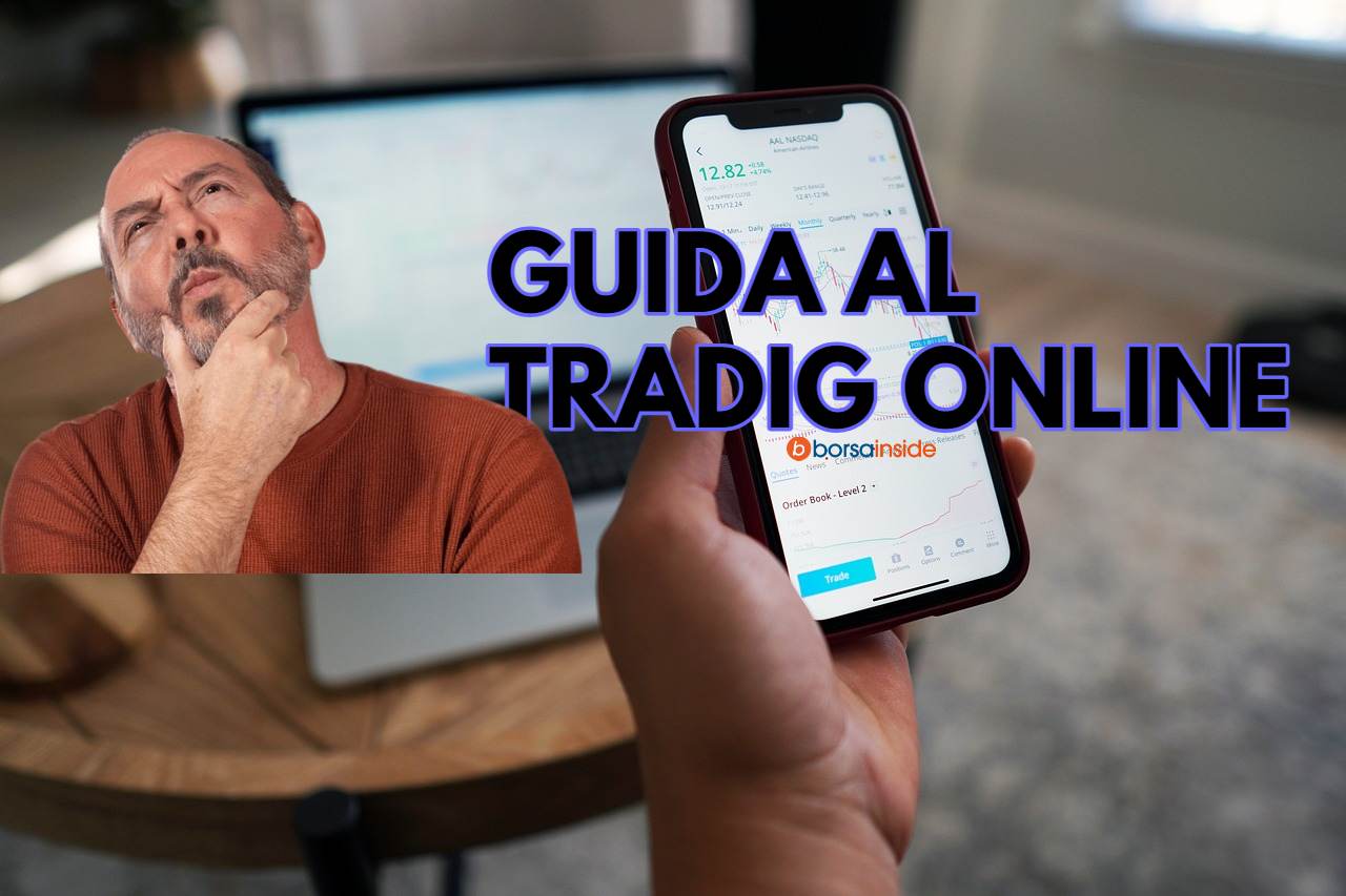 laptop e mobile trading con trader che pensa