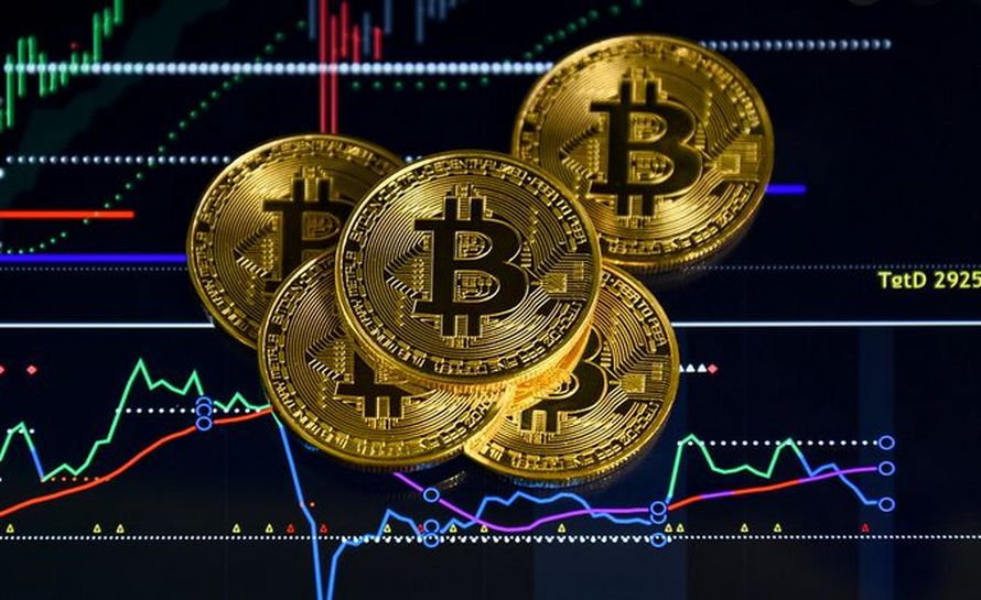 alcuni token di Bitcoin con grafici sull'andamento di prezzo sullo sfondo