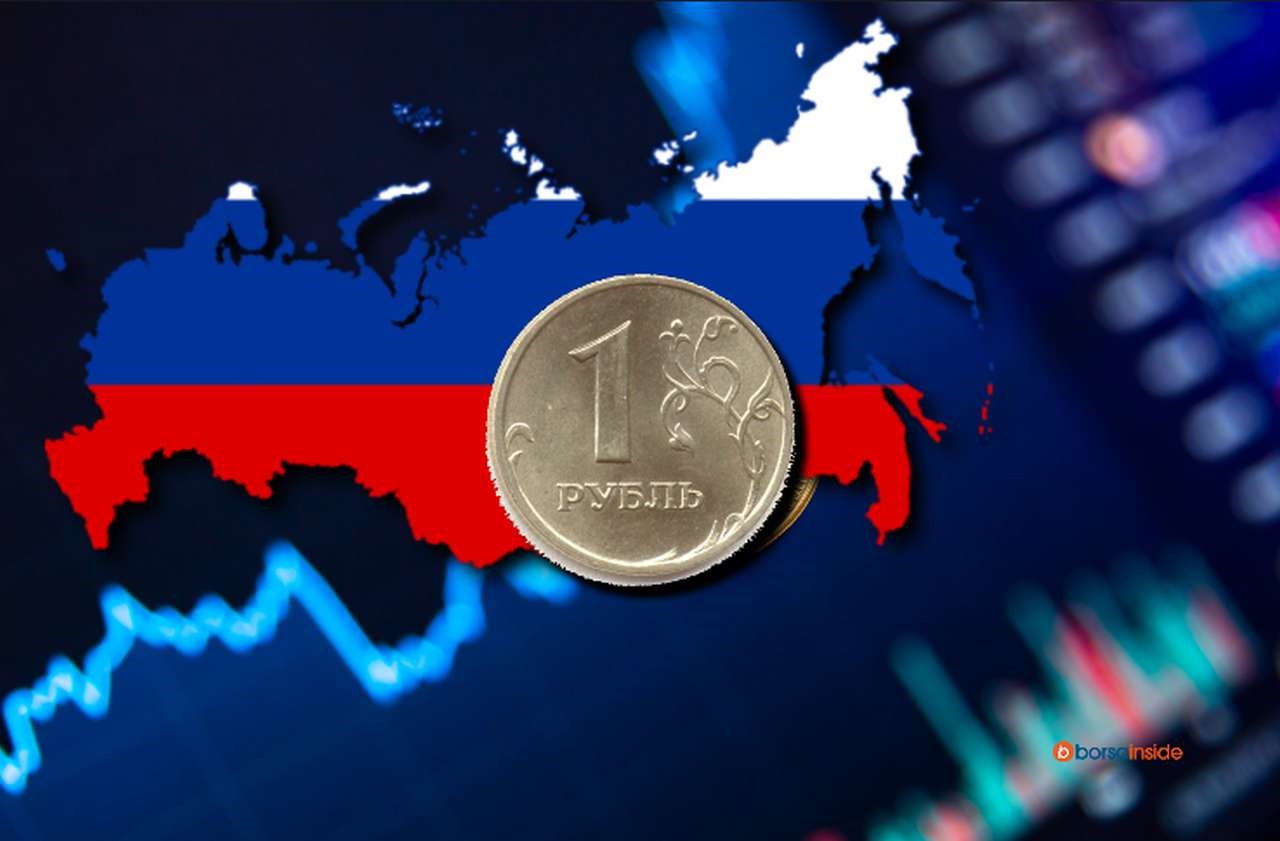 alcuni grafici sull'andamento dei prezzi nello sfondo, e la cartina della Russia con una moneta da 1 rublo