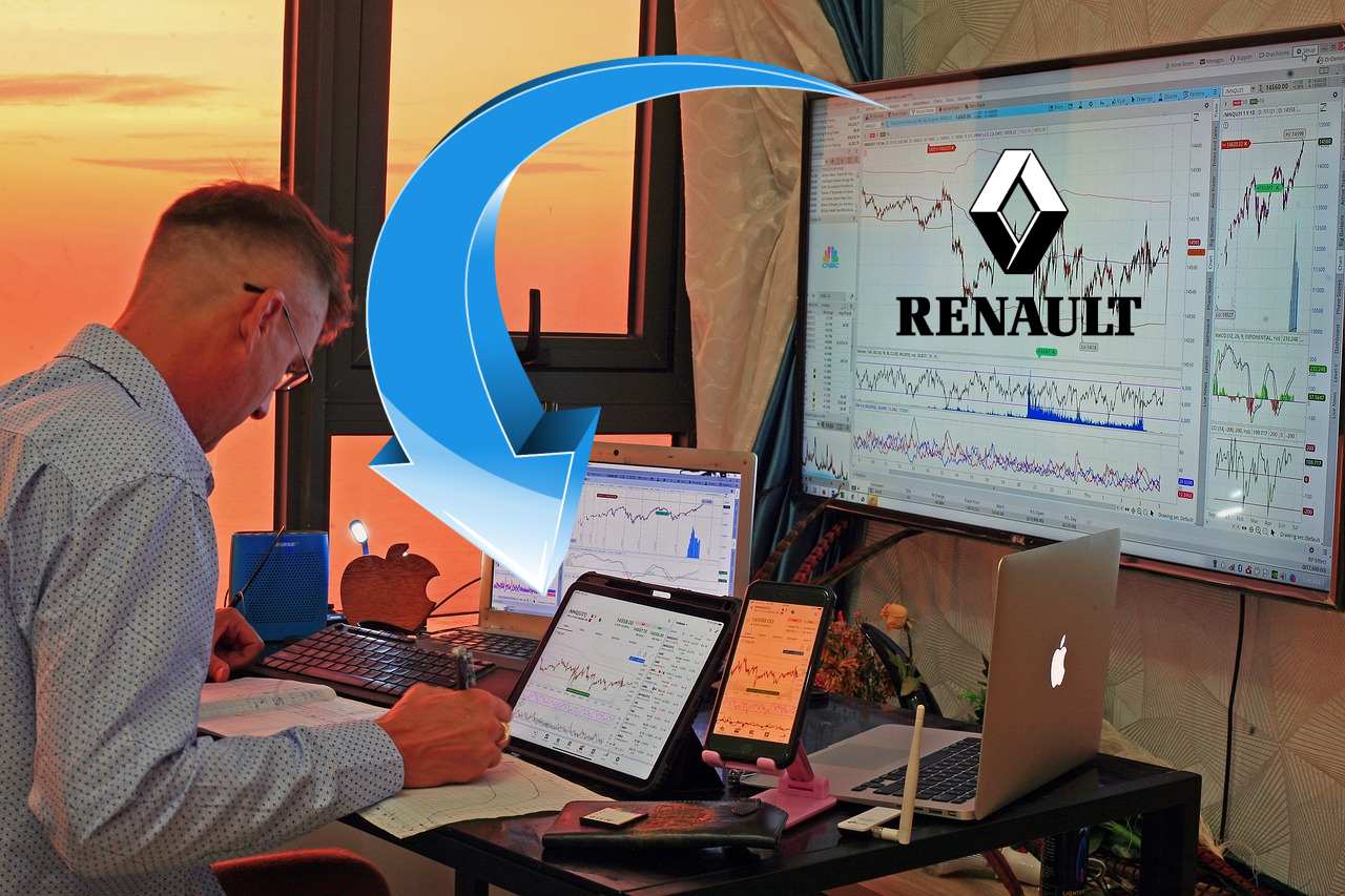 trader al lavoro con logo di Renault e freccia verso il basso