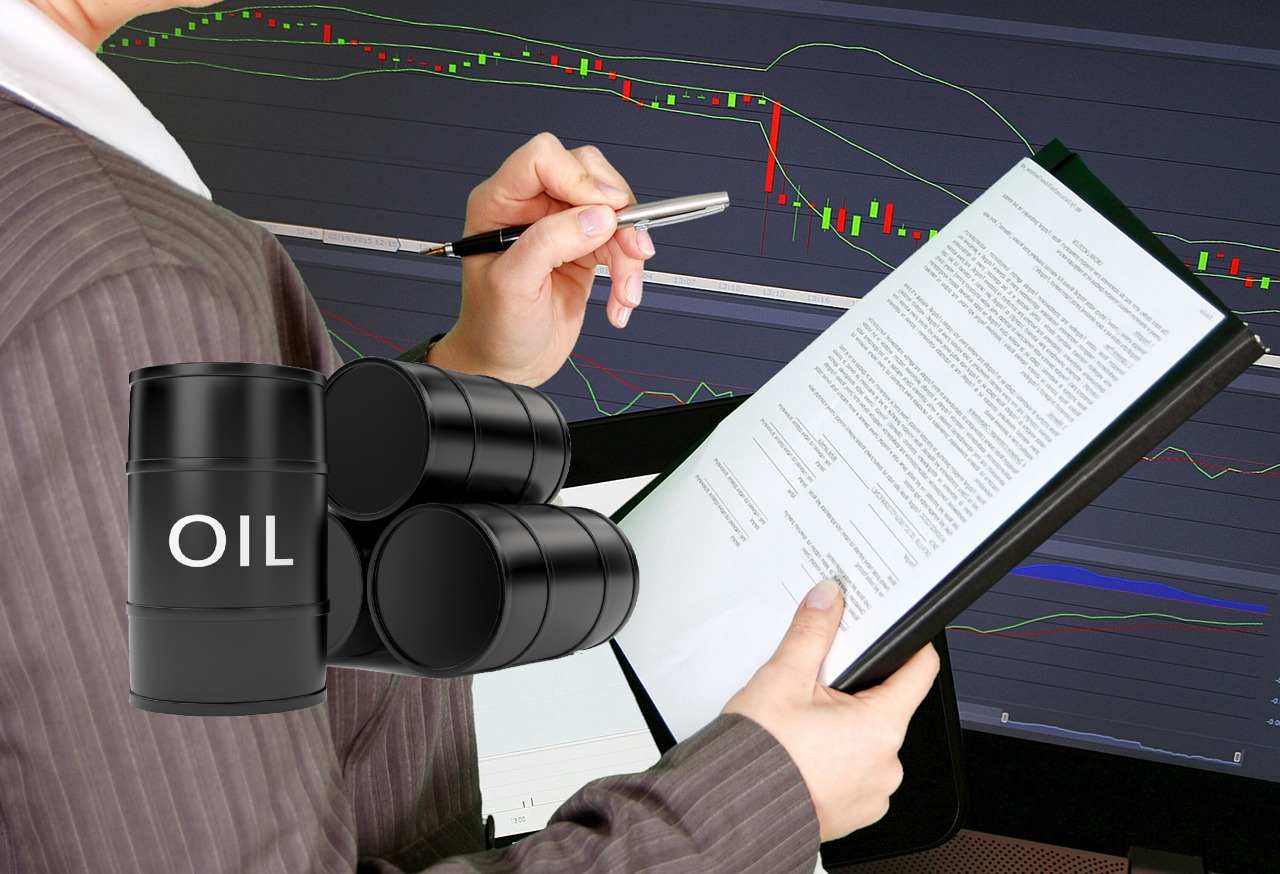 trader in azione e barili di petrolio