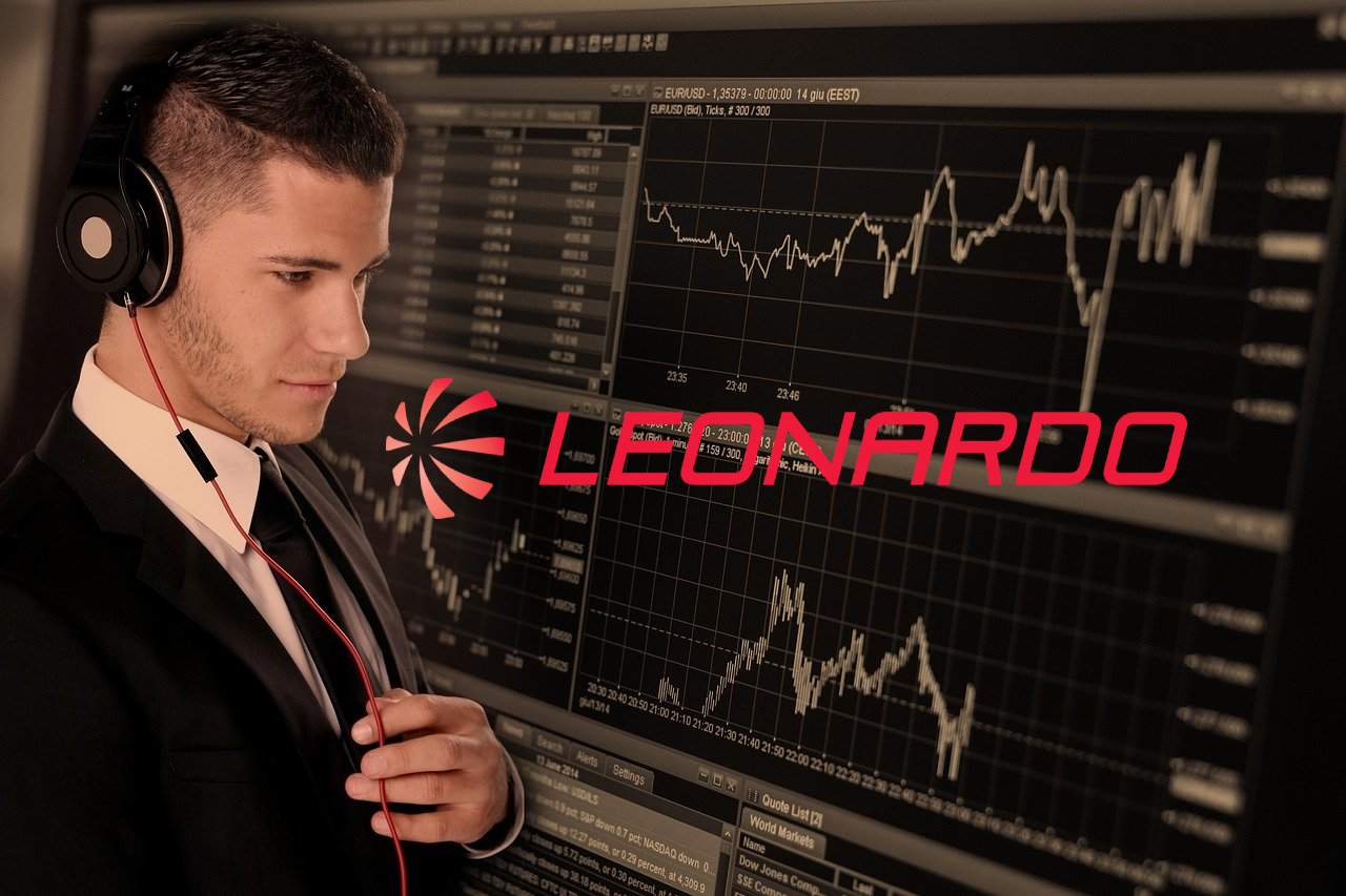 trader con sullo sfondo grafico di borsa e logo di Leonardo