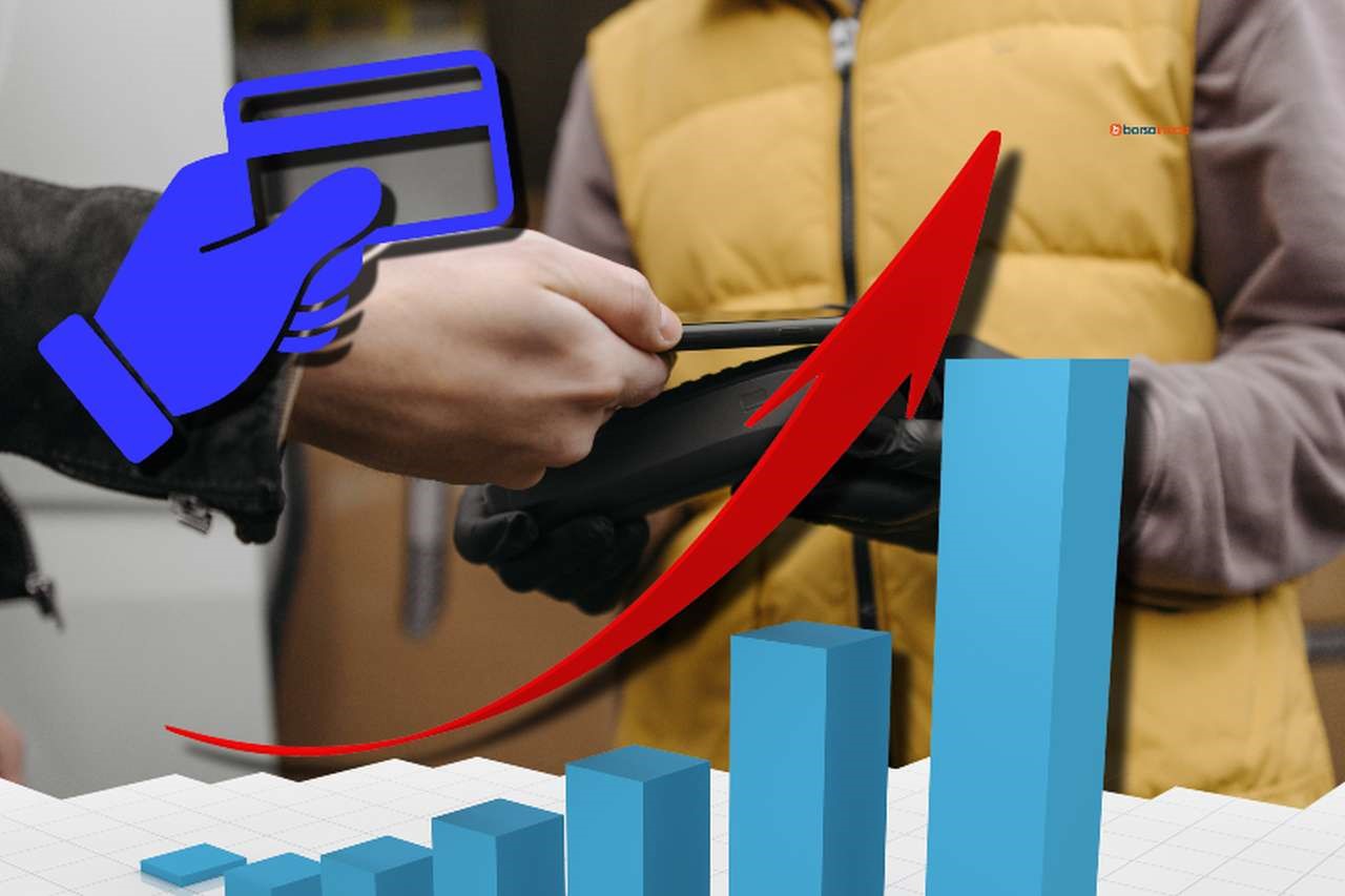 il pagamento attraverso pos usando uno smartphone e un grafico con una freccia in sovrimpressione
