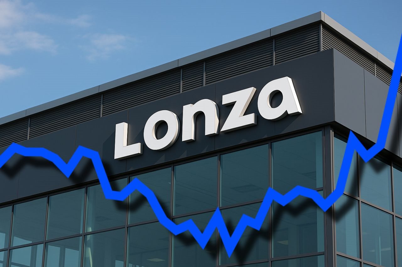 Un edificio con la scritta Lonza e una linea zig-zag di colore blu in sovrimpressione