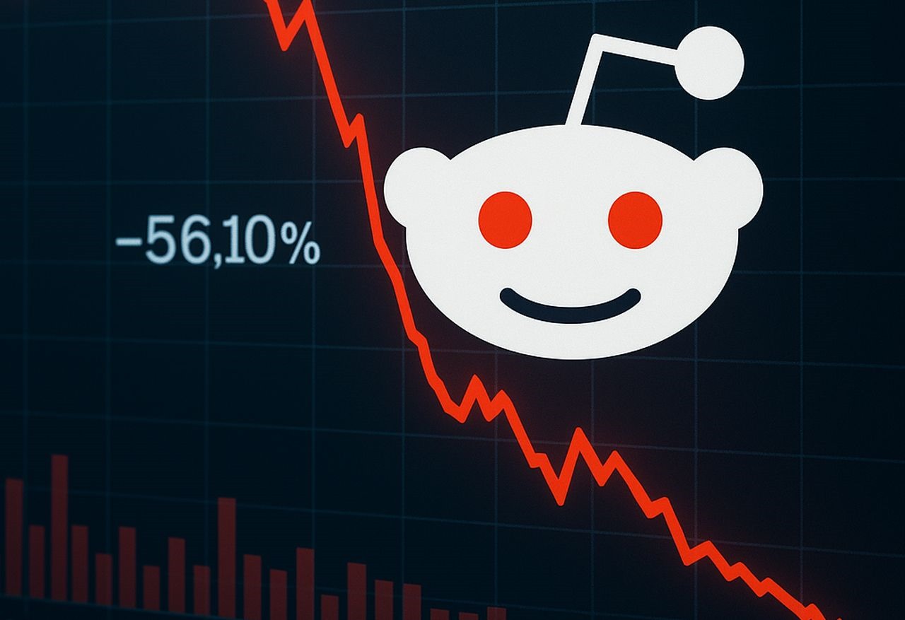 Logo di Reddit e un grafico finanziario in discesa
