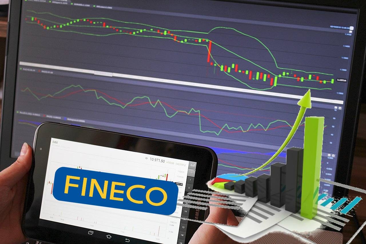 logo di Fineco su un tablet e grafico al rialzo
