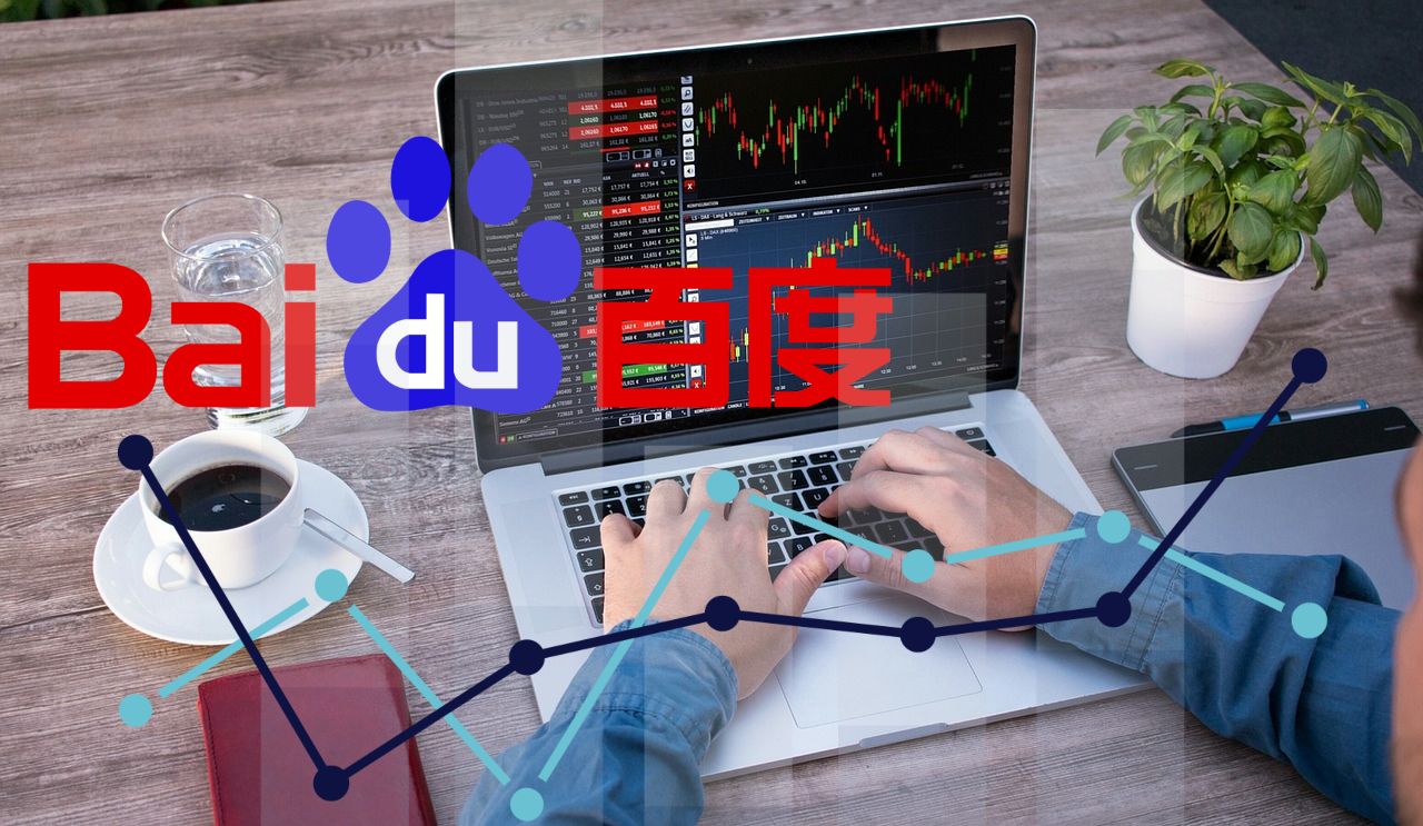 trader con laptop e logo di Baidu in primo piano