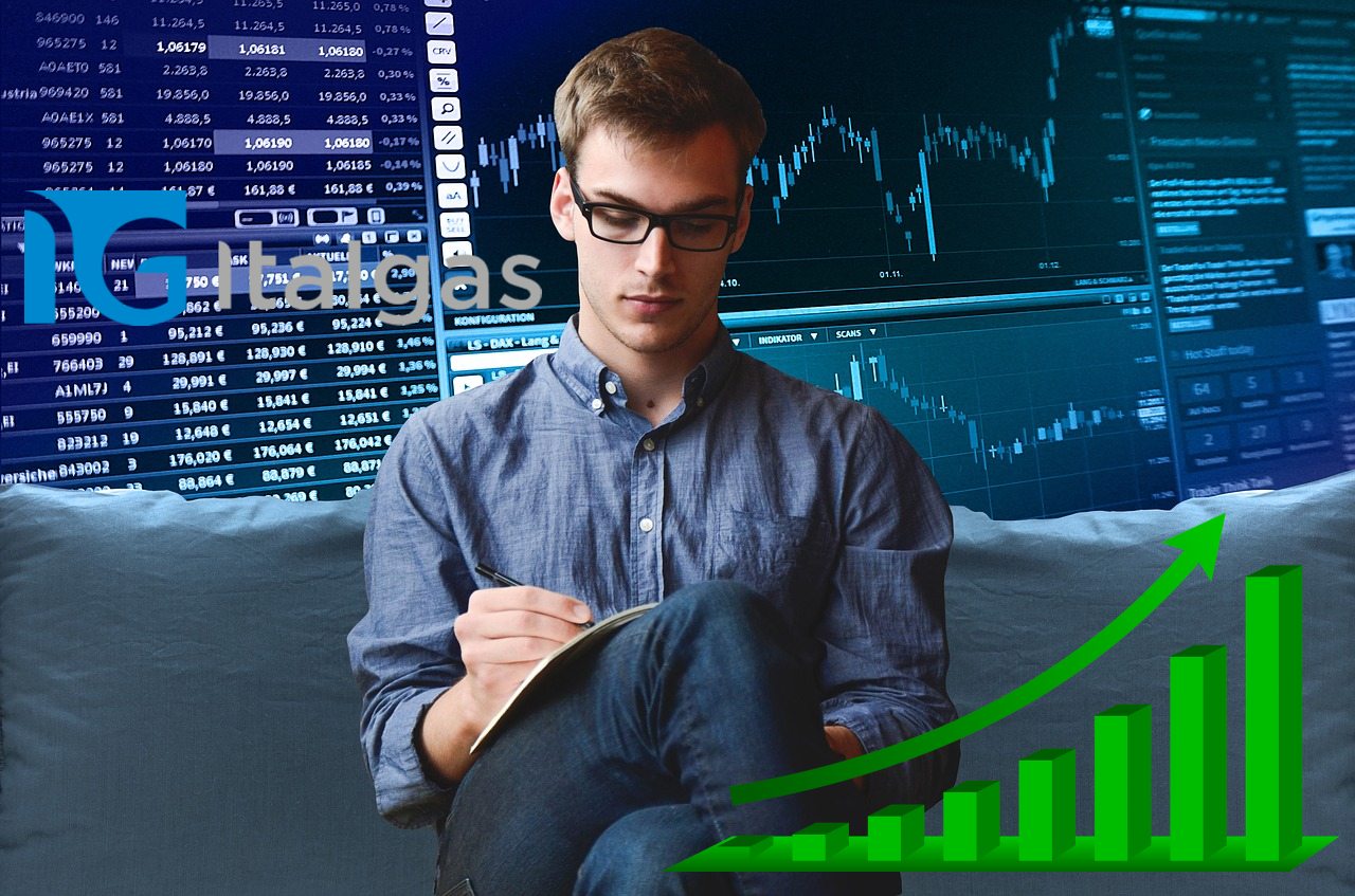 trader che prende appunti e logo di Italgas