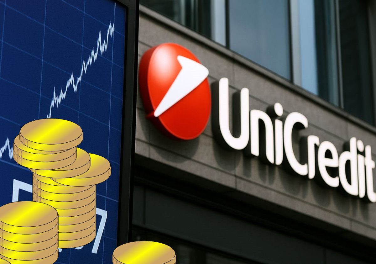insegna Unicredit e grafico di borsa