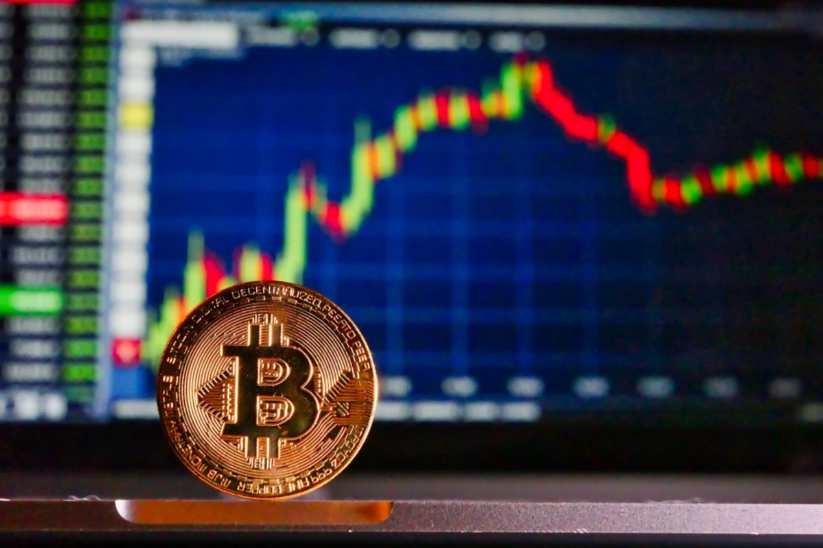 grafico di borsa e moneta Bitcoin