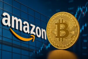 Scritta Amazon e moneta con simbolo di Bitcoin