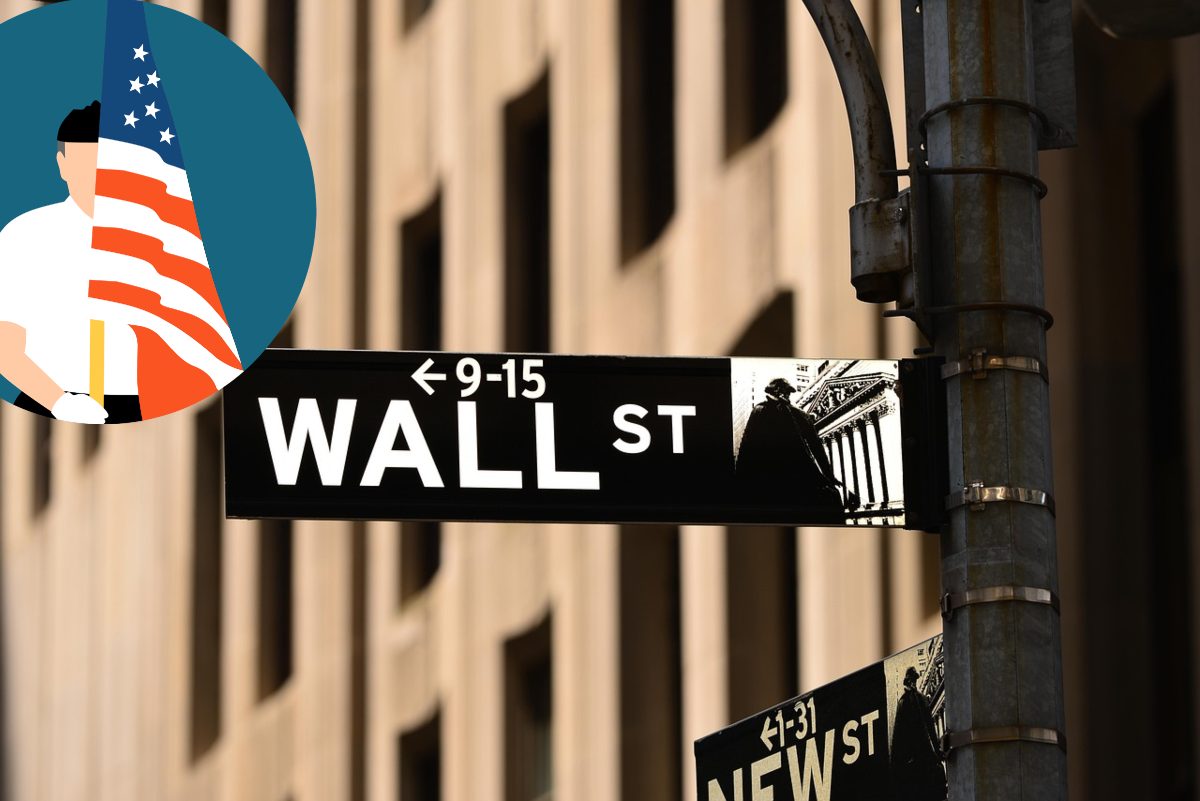 insegna Wall Street e lavoratore Usa